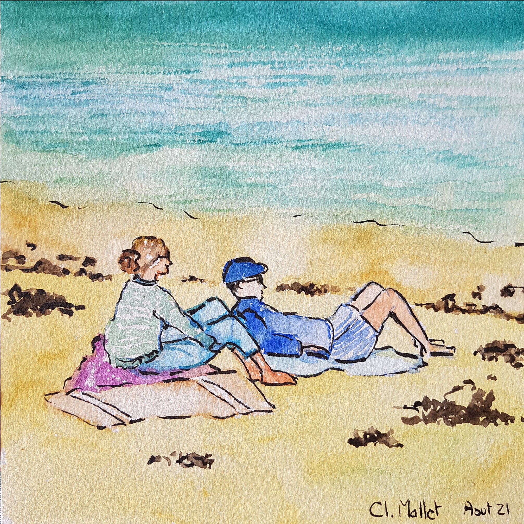 Couple en pulls a la plage claire mallet